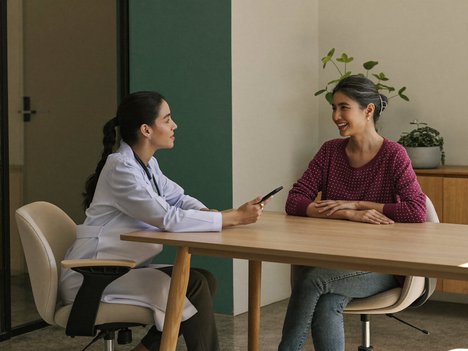 Doctor consulting a patient at Aventurine Aesthetics in Bangalore